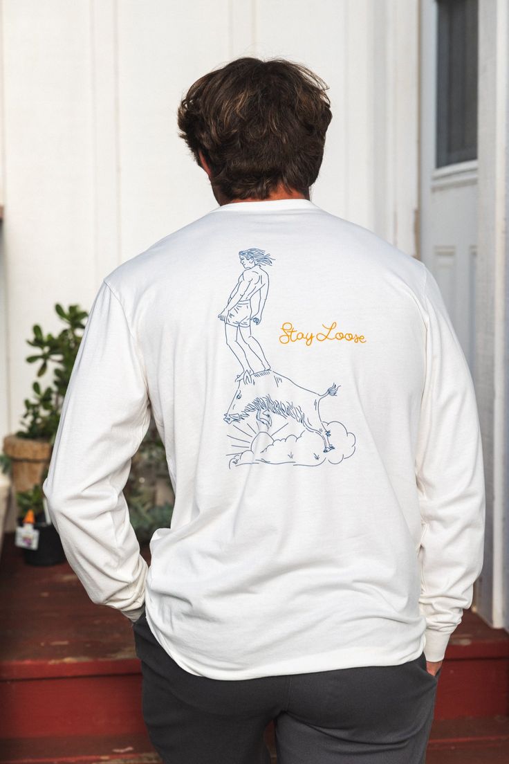 Ride into the sunset in our Boar Rider Longsleeve Tee. Design printed on the front and back of our custom cut and sew garment longsleeve tee. Featuring a set on collar standard crewneck and ribbed cuffs, printed on a super soft cotton fabric and includes our embroidered flag icon on right bottom side for style. "Aloha Xcnng" printed up the right sleeve and "Stay Loose" printed down the left. 100% Cotton - Pre-Shrunk and Laundered Designed on Kauai, Hawaii Fit Guide Male Model is 5'10 and wearing Cotton Long Sleeve T-shirt With Front Print, Unisex Long Sleeve Cotton Sweatshirt, Unisex Cotton Long Sleeve Sweatshirt, Long Sleeve Top With Front Print For Spring, Spring Long Sleeve Top With Front Print, Relaxed Fit Long Sleeve Top With Screen Print, Unisex White Long Sleeve T-shirt, Unisex Casual Long Sleeve Tops, Long Sleeve Cotton Top With Screen Print