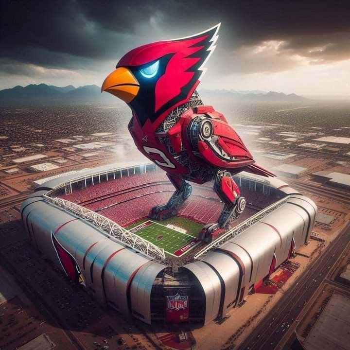 a large bird statue sitting on top of a soccer field