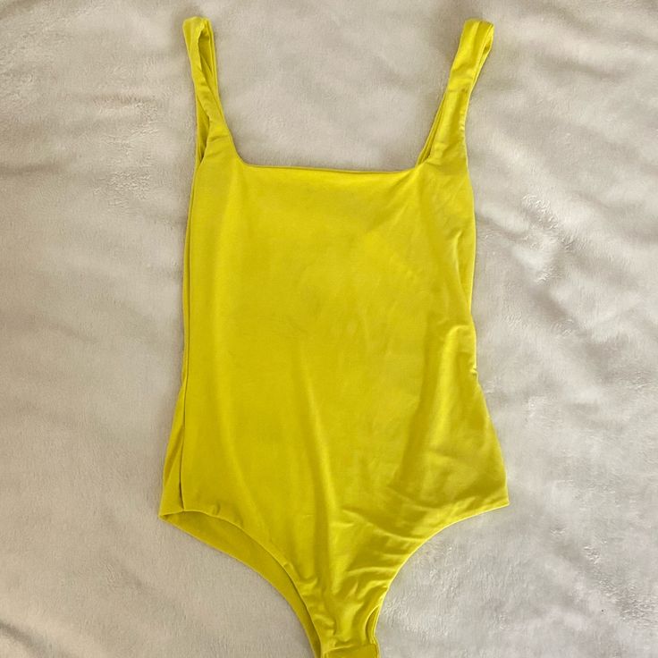 Yellow Is Super Bright And Attention Grabbing! Never Worn, Just Popped The Tag In Anticipation Of Wearing It Solid Color Bodysuit For Summer Swimming, Chic Summer Bodysuit In Solid Color, Summer Swimming Bodysuit Solid Color, Summer Basic Fitted Bodysuit, Basic Fitted Summer Bodysuit, Basic Fitted Bodysuit For Summer, Summer Basic Bodysuit, Basic Fitted Swimwear For Summer, Trendy Yellow One-piece Bodysuit