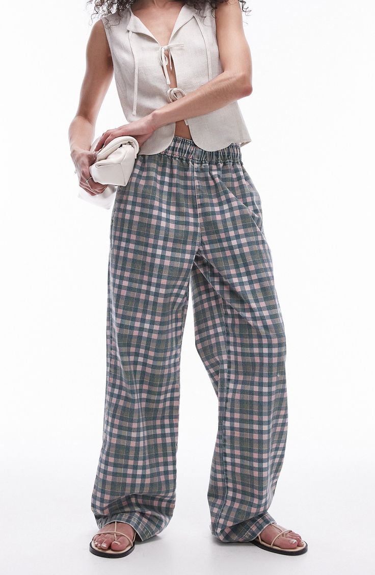 Neat checks lend depth to these straight-leg pants crafted from pure cotton twill and topped with a comfy elastic waist. Elastic waist Side-seam pockets 100% cotton Machine wash, line dry Made in Turkey Relaxed Fit Plaid Pants With Elastic Waistband, Plaid Bottoms With Elastic Waistband For Loungewear, Spring Plaid Loungewear Pants, Casual Plaid Bottoms With Elastic Waistband, Plaid Bottoms With Pockets For Loungewear, Casual Plaid Wide-leg Pants, Casual Wide-leg Plaid Pants, Plaid Straight Leg Pants For Spring, Casual Plaid Wide-leg Bottoms