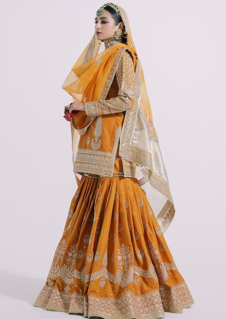 Transitional Raw Silk Sharara With Zari Work, Silk Palazzo Set For Eid And Traditional Ceremonies, Dola Silk Sharara For Traditional Ceremonies, Bollywood Style Palazzo Set For Traditional Ceremonies, Silk Sharara With Straight Kurta For Traditional Ceremonies, Orange Chinon Bollywood Dupatta, Orange Bollywood Style Chinon Dupatta, Bollywood Orange Chinon Dupatta, Bollywood Style Orange Chinon Dupatta