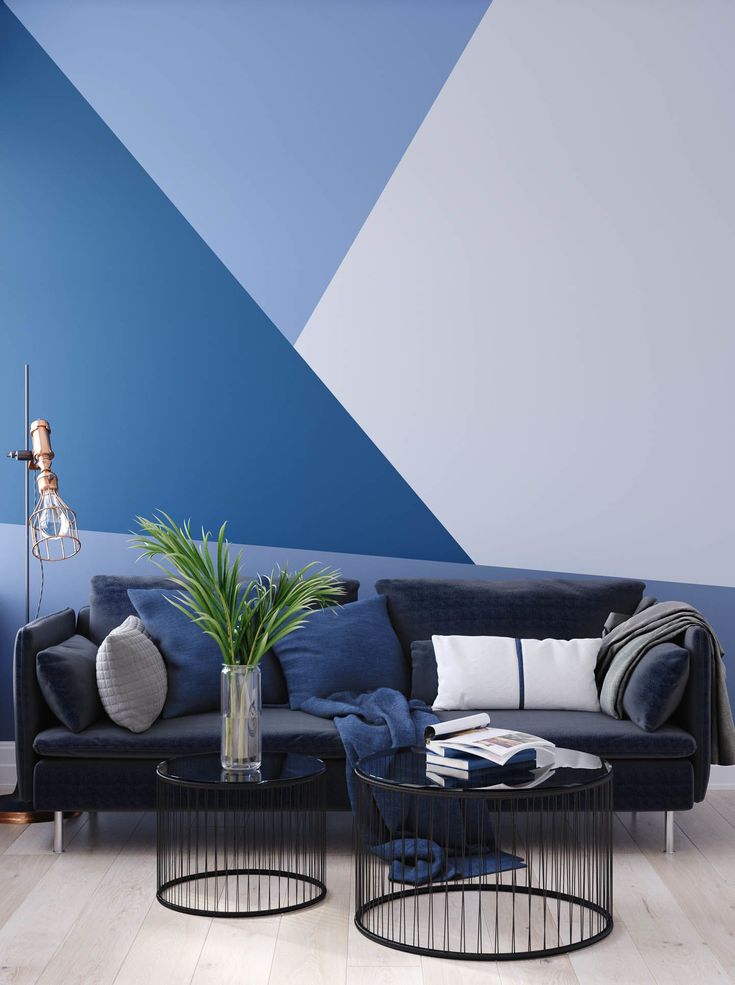 a living room with blue and white walls