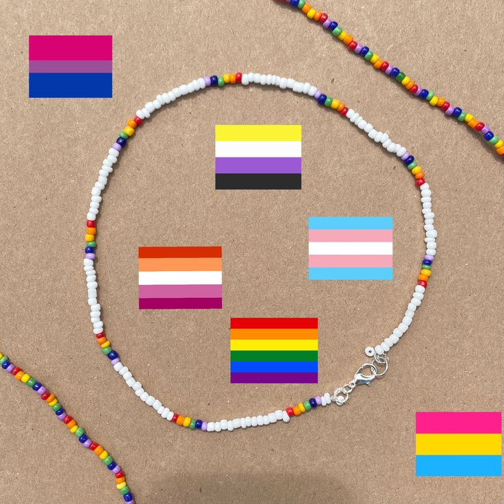 Rainbow Pride Necklace | Beaded Rainbow Necklace -14 inches  -basic lobster clasp, non-stretchy  -nickel free metal materials  -made with white beads and accent coloured beads  🏳️🌈similar pride necklaces🏳️ https://www.etsy.com/ca/listing/965150064/ custom flag? message me which flag you'd like and i'll provide photos of colour shades i have in stock :) shipping: untracked ♻️eco packaging  tags: pride necklace free shipping rainbow aesthetic jewelry beaded necklace rainbow jewelry pride jewelry Pride Jewelry Diy, Lgbtq Necklace, Collares Aesthetic, Beaded Rainbow, Pride Necklace, Pride Jewellery, Colour Shades, Bracelets Patterns, Eco Packaging