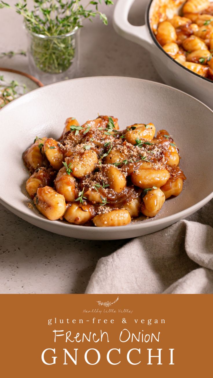 a white bowl filled with food on top of a table