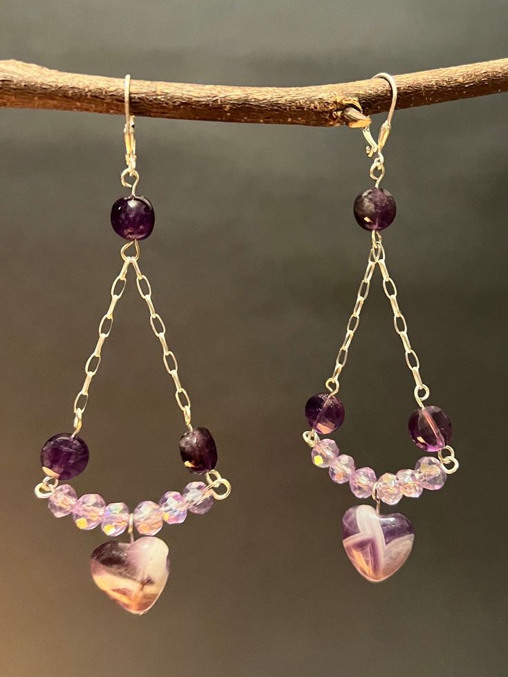 These are beautiful handmade chandelier amethyst sterling silver earrings beautiful faceted and heart amethyst with crystal dangling by sterling silver chain with sterling silver leverbacks. Handmade Chandelier, Crystal Chandelier Earrings, Heart Crystal, Heart Gemstone, Style Earrings, Amethyst Gemstone, Sterling Silver Chain, Crystal Chandelier, Chandelier Earrings