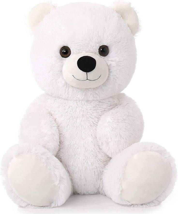 a white teddy bear sitting up against a white background