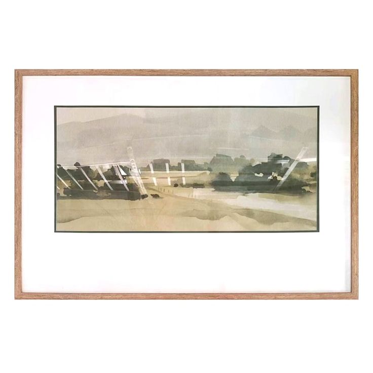 an abstract painting with watercolors on paper in a wooden frame hanging on the wall