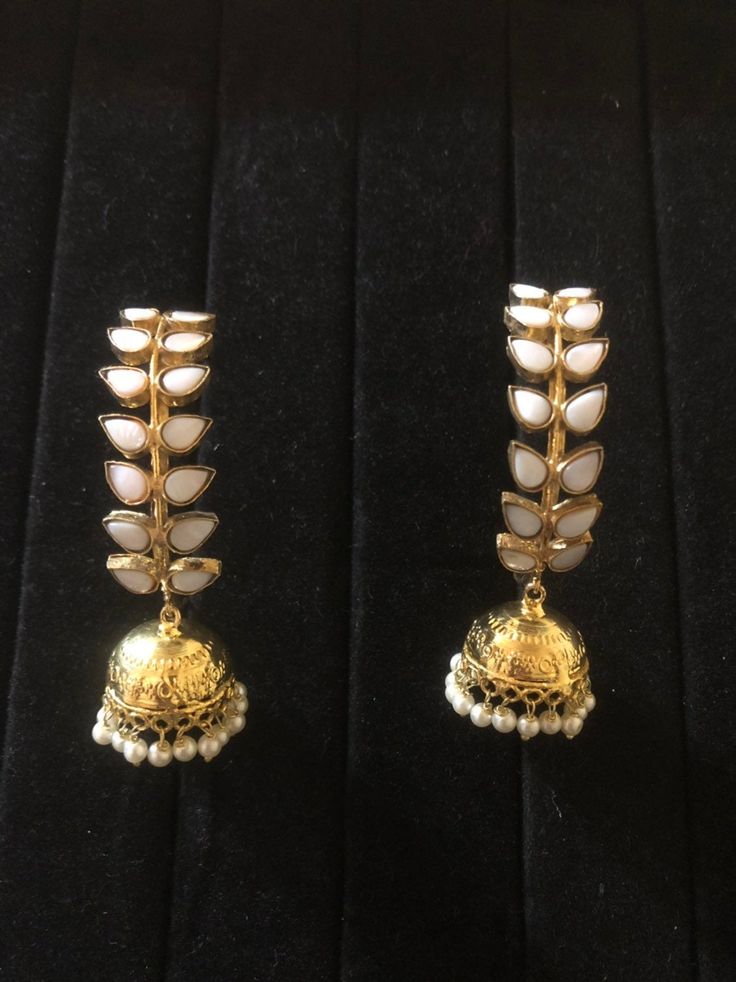 Very beautiful Bali and jhumki style hoop earrings.semi precious stones two color White : pre order and shipping time 4-6 weeks. Hand crafted and gold plated kundan indian/pakistani jewelry Material:brass,stone,gemstone,pearl We bring you casual as well as party wear jewelry which comes with an attractive design and style. It goes well modern and traditional outfits. Visit my website for more collections https://www.etsy.com/shop/Noorzaracollection Elegant Dual-tone Metal Earrings, Gift Stone Work Pearl Drop Earrings, White Jewelry With Latkans For Celebration, Gift Pearl Drop Earrings With Stone Work, White Chandbalis For Eid Celebration, White Bridal Earrings For Eid Celebration, Celebration White Jewelry With Latkans, Stone Work Jewelry For Eid, White Hand-set Chandbalis For Diwali