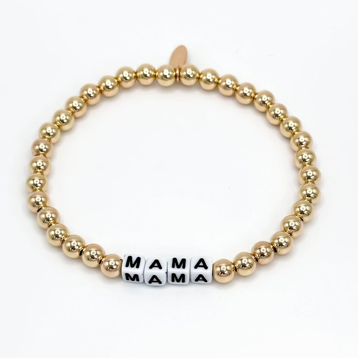 Made for YOU. Our Custom Gold-filled, 5mm beaded bracelet can be personalized with black or white letters. If you are looking for a genuine customizable gift, then look no further. Our Jonesy Wood Custom Gold-filled bracelet is the perfect gift for any special occasion. Custom words available, just choose which color (black or white) and place a note at checkout letting us know what word you prefer. available in white block letters or round black letters 14k gold filled 5mm smooth beads Stretchy Minimalist Letter Beads Stretch Bracelet As Gift, Minimalist Letter Beads Stretch Bracelet Gift, Mother's Day Name Bracelet With Letter Beads, Personalized Meaningful Stretch Bracelet, Classic Hypoallergenic Beaded Bracelets As Gift, Personalized Meaningful Stretch Bracelet For Everyday, Hypoallergenic Classic Beaded Bracelets As Gift, Classic Hypoallergenic Stretch Bracelet As A Gift, Classic Hypoallergenic Stretch Bracelet As Gift