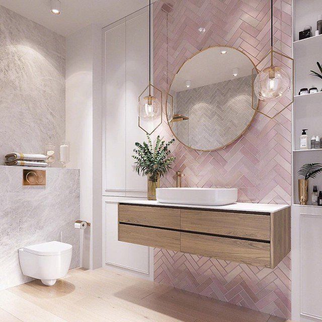 a bathroom with marble and wood accents