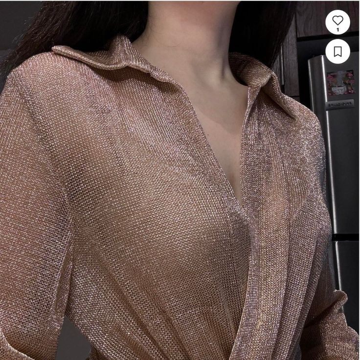 Zara Rose Gold Metallic Thread Pleated Blouse New With Tag! Size: Xs Made In Morocco Dazzle In This Stunning Gold Shimmer Blouse From Zara, Perfect For Adding A Touch Of Glamour To Your Wardrobe. This Piece Features Long Sleeves With Buttoned Cuffs And A Flattering Wrap Front That Ties At The Side, Creating A Sophisticated Draped Effect. The High Collar Adds A Modern Twist To This Eye-Catching Design. Ideal For Evening Events Or Stylish Daywear. A11-016-Xs Elegant V-neck Party Shirt, Gold Spring Party Shirt, Gold Party Shirt For Spring, Elegant V-neck Shirt For Party, Summer V-neck Party Shirt, Zara V-neck Party Blouse, Spring V-neck Party Shirt, Chic Zara Party Shirt, Chic Zara Shirt For Party