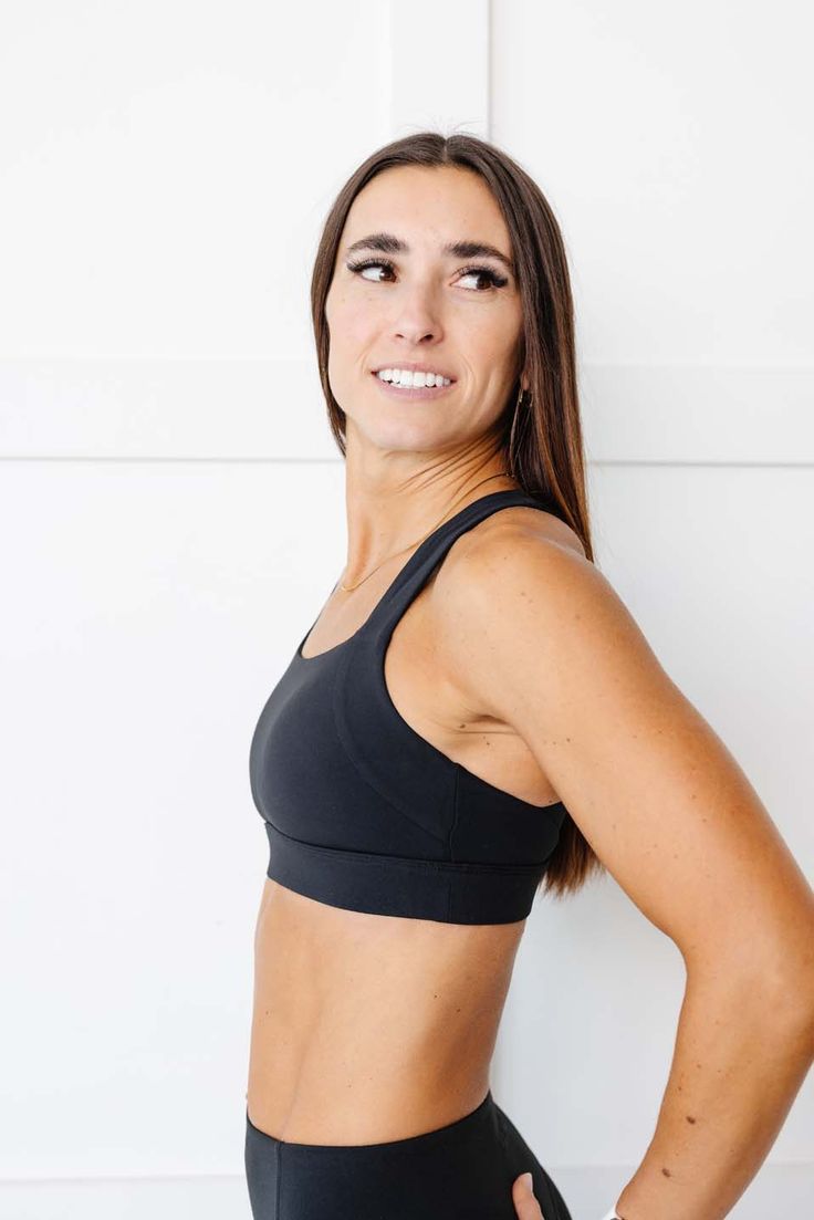 Elevating your activewear ensemble with its sleek design and unmatched support, this sports bra is tailored to provide the ample support and coverage you need for your most intense workouts. Featuring a square neckline for a modern twist and offering more coverage than our other styles, it ensures confidence with every move. The thick bottom band offers high-impact support, keeping you secure and comfortable throughout your most rigorous activities. Pair it with our Icon Legging for a coordinate Versatile Sports Bra With Built-in Padding For Training, Black Sculpting Activewear With Built-in Bra, Sporty Sculpting Sports Bra, Sporty Sports Bra With Built-in Padding For Pilates, Modern Stretch Sports Bra With Built-in Bra, Functional Sculpting Sports Bra For Workout, Sculpting Black Activewear With Built-in Bra, Athleisure Sports Bra With Sculpting Padding, Gym Sports Bra With Light Support And Sculpting Fit