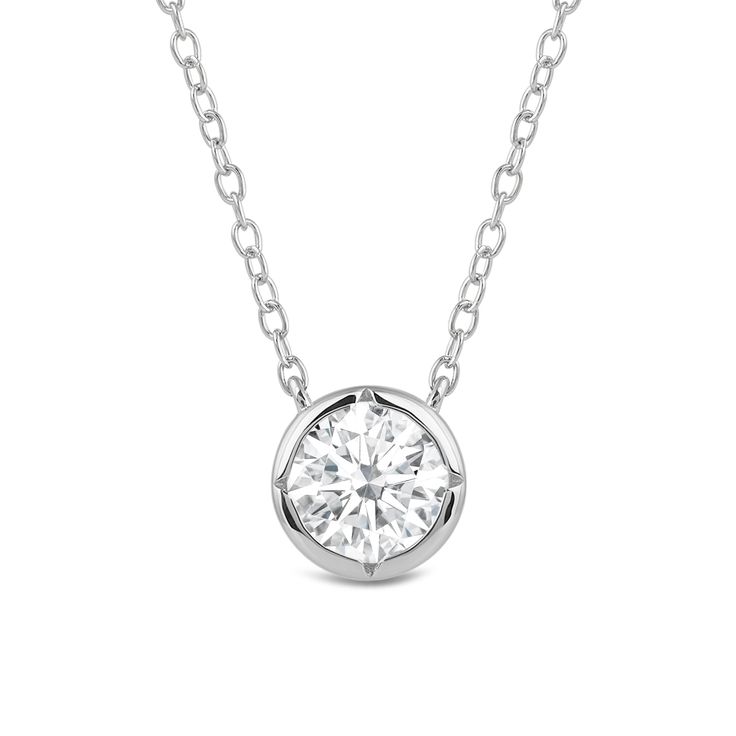 A classic bezel set solitaire Necklace with points of a kite shape chamfered on the wall completing the With Clarity signature design. Style this sparkling necklace everyday to match any look effortlessly. Classic Solitaire Necklace With Bezel Setting, White Gold Solitaire Necklace With Bezel-set Round Stone, Formal Solitaire Pendant Necklace With Bezel Setting, Classic Solitaire Pendant Necklace With Bezel Setting, Timeless Solitaire Necklace In Diamond White With Bezel Setting, Timeless Diamond Solitaire Necklace With Bezel Setting, Classic Pendant Diamond Necklace With Bezel Setting, Fine Jewelry Solitaire Necklace With Bezel Setting, Timeless Diamond White Necklaces With Bezel Setting