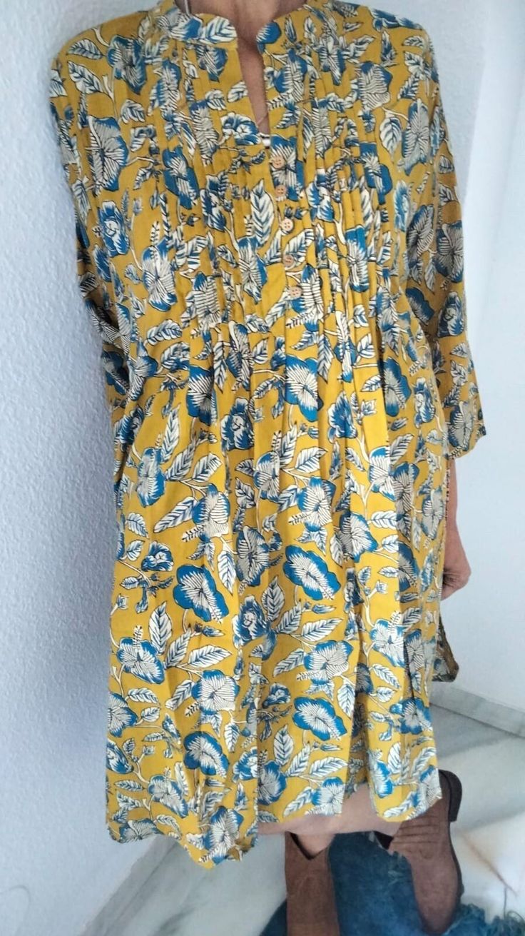 Cotton pintuck dress Bohemian Tunic Dress Relaxed Fit, Bohemian Relaxed Fit Tunic Dress, Cotton Smock Dress For Day Out, Bohemian Tunic With Relaxed Fit For Daywear, Bohemian Tunic For Daywear With Relaxed Fit, Yellow Relaxed Fit Dress For Vacation, Bohemian Split Neck Day Dress, Yellow Block Print Beach Dress, Yellow Block Print Dresses For The Beach