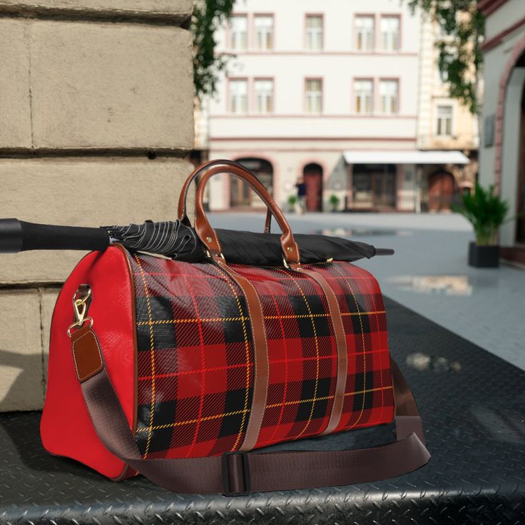 Beautiful plaid printed travel bag. Made with high-grade waterproof fabric, it's a highly durable means of transferring your essentials wherever you go. With multiple compartments, a resilient carrying handle, and an adjustable shoulder strap, it's the perfect companion for all your adventures.  .: 100% high-grade PU leather .: One size: 20" × 12'' × 9" (50.8cm × 30.5cm × 23cm ) .: Brown PU leather handles and an adjustable shoulder strap .: Polyester lining .: Gold-colored zipper  .: All-over printImages by [Zlatko Guzmic, Zlatko Guzmic, Zlatko Guzmic, Zlatko Guzmic / Shutterstock]Images by [vector punch, vector punch, vector punch, vector punch / Shutterstock]Images by [vector punch, vector punch, vector punch, vector punch / Shutterstock]Images by [vector punch, vector punch, vector pun Red Waterproof Travel Bag, Large Capacity Red Shoulder Bag For Travel, Waterproof Red Rectangular Bag, Red Weekender Bag For Travel, Red Rectangular Travel Bag With Zipper, Red Rectangular Duffle Bag With Zipper Closure, Red Waterproof Outdoor Bags, Casual Red Waterproof Bags, Red Duffle Bag With Luggage Sleeve For Weekend Trips