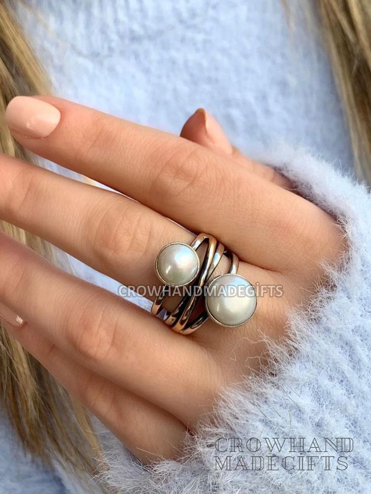 Description : Pearl Stone Cross Silver Ring, Pearl Silver Ring, Pearl Ring, 925 Sterling Silver Ring, Authentic Ring, Mother Day Ring, christmas day gift pearl ring, Five Stone Ring, coral pearl ring, mother of pearl ring, 925 silver pearl, pearl silver ring, sterling silver ring, white pearl ring, freshwater pearl, mother of pearl, multi stone ring, pearl ring silver, silver pearl ring Handmade item Materials: Pearl , Silver Gemstone: Pearl,  Gem color: White Band color: Silver/Gold Style: Minimalist Recycled Nickel-free Fine Jewelry Rings For Anniversary, Anniversary Nickel-free Fine Jewelry Rings, Sterling Silver White Gold Pearl Ring, Rose Gold Sterling Silver Stackable Open Rings, Rose Gold Sterling Silver Open Stackable Rings, White Gold Sterling Silver Pearl Ring, Everyday White Gold Pearl Ring In Sterling Silver, Everyday White Gold Sterling Silver Pearl Ring, Silver Sterling Pearl Ring