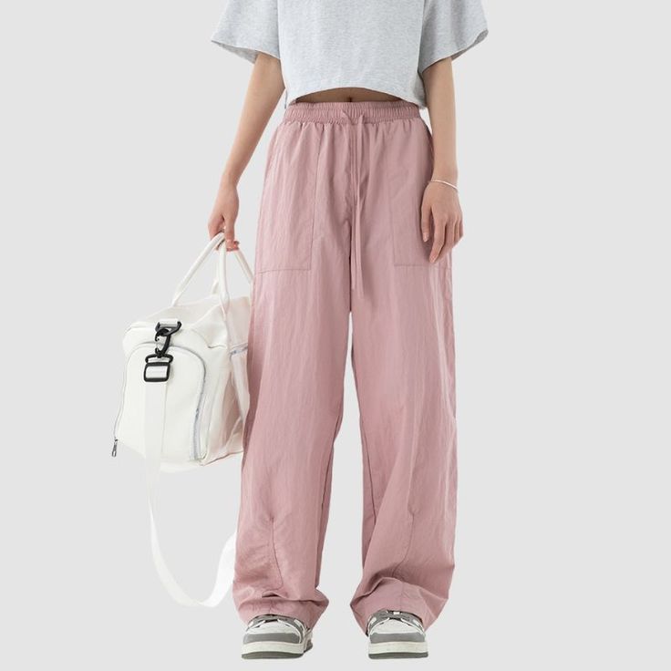 Material: 95% NylonFeatures: Pants, cargo pants, parachute pants, wide legs, slightly elastic, light, drawstring waist, solid color, straight-leg, relaxed fit, loose, soft, breathable, couple outfits.Style: Casual, college