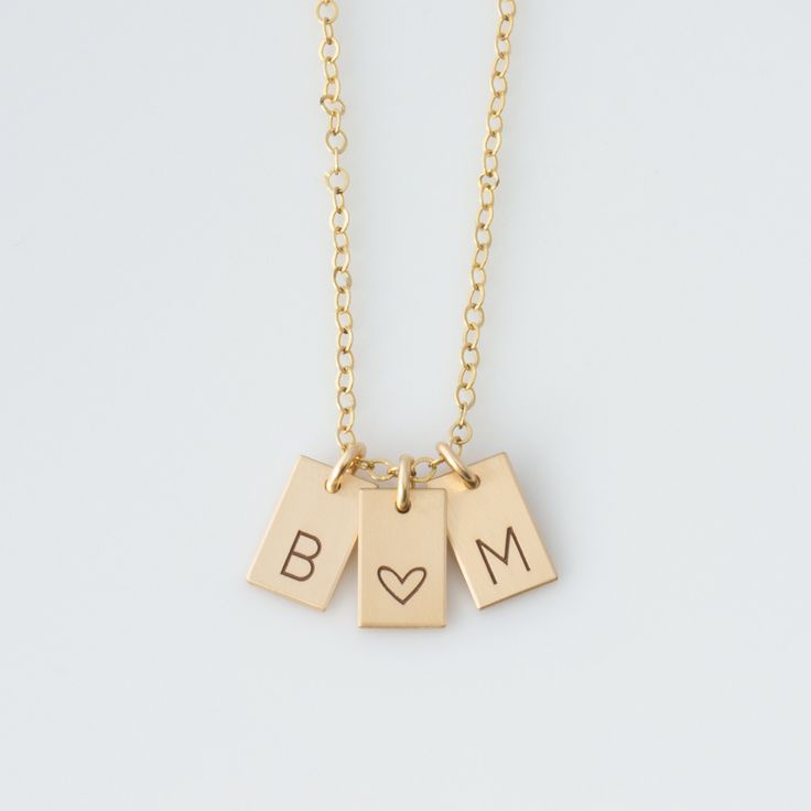 "The Mini Bar Initial Necklace is a simple, dainty, personalized necklace that comes in 14k gold fill, rose gold fill, or sterling silver. Create your own meaningful piece with initials or symbols! Choose form 1- 4 bars for a custom necklace personalized just for you! Personalized vertical bar necklace can be engraved with dates, initials, symbols, short names, etc... Engraved and hand assembled with care and love, it comes in 14k gold fill, rose gold fill, or sterling silver. A perfect gift for Customizable Minimalist Rose Gold Charm Necklace, Customizable Rose Gold Dainty Charm Necklace, Customizable Minimalist Rose Gold Necklace, Minimalist Customizable Rose Gold Necklace, Minimalist 14k Gold Filled Necklace For Personalized Gift, Customizable Dainty Rose Gold Necklace, Dainty Customizable Rose Gold Necklace, Minimalist Customizable Charm Necklaces For Personalized Gifts, Customizable Minimalist Charm Necklace For Personalized Gift