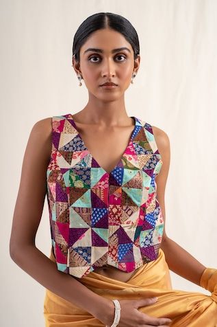 Multi color brocade patchwork waistcoat style blouse. - Aza Fashions Designer Multicolor Padded Blouse, Festive Multicolor Cotton Silk Tops, Multicolor Cotton Silk Designer Blouse, Designer Multicolor Cotton Silk Blouse, Multicolor Designer Cotton Silk Blouse, Multicolor Fitted Designer Wear Tops, Multicolor Sleeveless Padded Blouse, Multicolor Padded Sleeveless Blouse, Festive Multicolor Block Print Tops