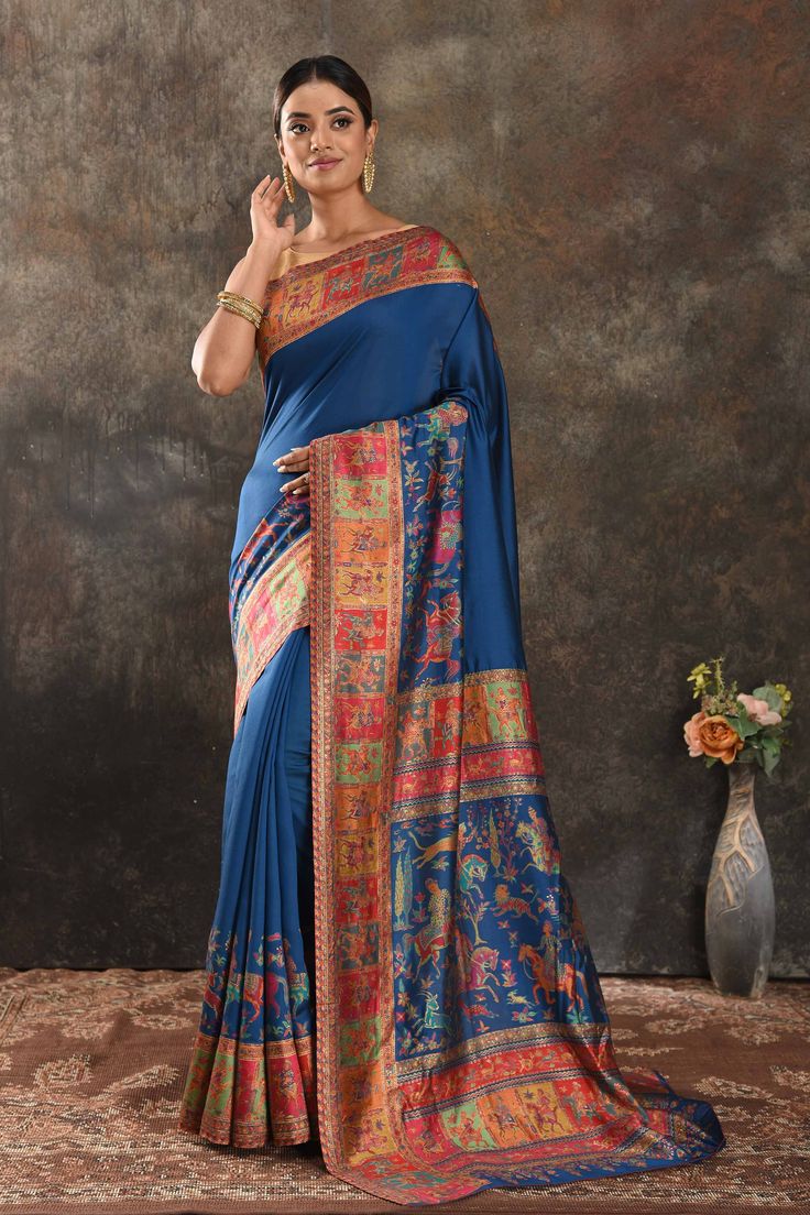 Shop stunning blue Kani silk saree online in USA. Keep your ethnic wardrobe up to date with latest designer sarees, pure silk sarees, handwoven saris, tussar silk sarees, Kani sarees, Pashmina sarees, embroidered sarees from Pure Elegance Indian saree store in USA.-full view Blue Pre-draped Saree With Zari Weaving For Navratri, Blue Paithani Silk Pre-draped Saree With Traditional Drape, Blue Pre-draped Saree With Zari Work For Festivals, Traditional Blue Pre-draped Saree With Dupatta, Blue Bollywood Banarasi Silk Pre-draped Saree, Blue Raw Silk Pre-draped Saree For Festivals, Festive Blue Art Silk Pre-draped Saree, Festive Blue Handloom Pre-draped Saree, Blue Katan Silk Pre-draped Saree