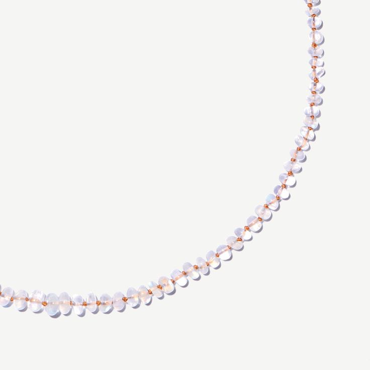 This Rainbow Moonstone Necklace has been delicately crafted by hand using a bronze thread DETAILS -Metal : 14ct Gold Vermeil  -Gemstone : Rainbow Moonstone -Length : 16" with extender chain which extends by 5 and 10cm  -Bead size : 3-4mm -Thread : Bronze Knotted ABOUT THE GEMSTONE Rainbow Moonstone is known for its soo Dainty Adjustable Moonstone Necklace, Gold Moonstone Briolette Necklace, Elegant Moonstone Gemstone Beaded Necklace, Gold Necklace With Moonstone Briolette, Gold Moonstone Necklace With Briolette Shape, Dainty Handmade Moonstone Necklace, Handmade Dainty Moonstone Necklace, Adjustable Beaded Moonstone Necklace, Elegant Moonstone Necklaces With Gemstone Beads