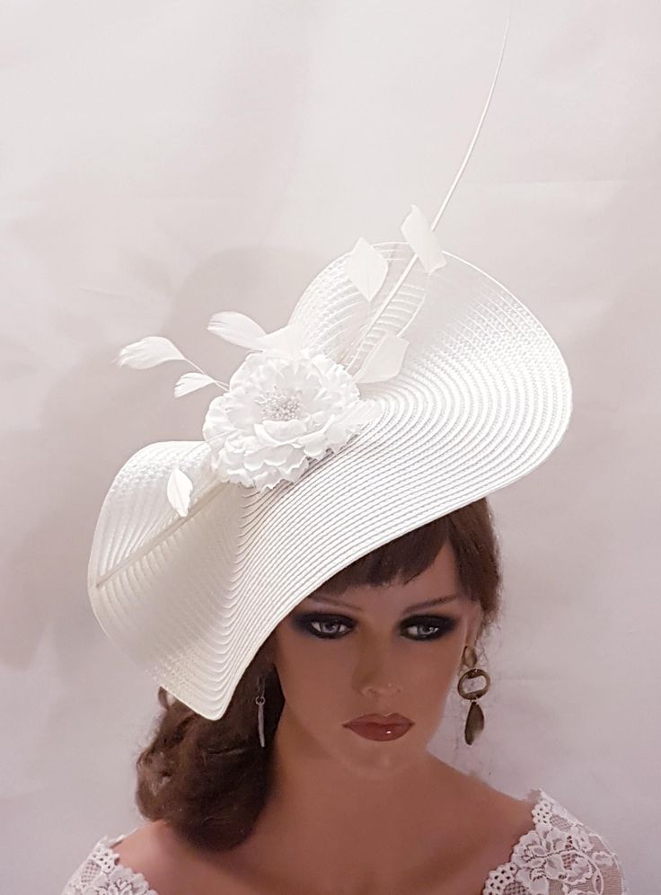 Large WHITE Hat Fascinator with long Quill Feather and Flowers, perfect for Royal Ascot, Kentucky Derby, Weddings Goodwood revival, Christening, Ascot or any special occasion. Gorgeous white straw weave Hat fascinator long quill feather and   Silk flowers This hat has been made by hand and very light to wear. This hat is designed to be worn tilted on the side of the head with  long Quill feathers and Feather detail for a beautifull Glamorous look. Attachment option: Alice band (BY DEFAULT HEADBAND WILL BE BLACK SATIN COVERED. IF YOU LIKE TO HAVE IN BROWN OR OTHER COLOURS PLEASE ADD A NOTE AT CHECKOUT) White Fitted Boater Hat With Short Brim, White Fitted Top Hat With High Crown, Elegant White High Crown Mini Hat, Fitted White Headpiece For Church, Fitted White Headpiece For Ceremony, Fitted White Ceremony Headpiece, White Fitted Ceremony Headpieces, Fitted White Brimmed Top Hat, White Mini Hat For Kentucky Derby Ceremony