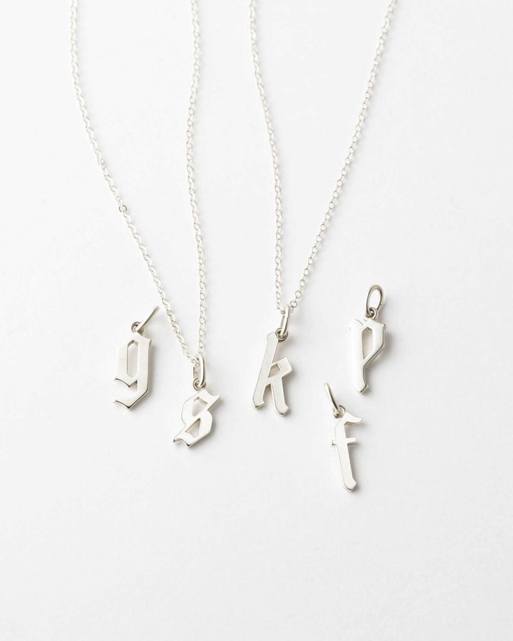 Take center stage. Choose a gothic initial pendant that means the most and let it steal the show paired with a delicate Dainty Chain. Create a custom look by adding extra letters, disks, or tags with our personalized add-ons.Looking for something a little bolder – check out the Bold Gothic Initial Necklace. Silver Custom Name Charm Necklace For Everyday, Everyday Silver Charm Necklace With Custom Name, Personalized Sterling Silver Initial Pendant Charm Necklaces, Personalized Sterling Silver Initial Pendant Charm Necklace, Sterling Silver Initial Necklace With Charms As A Gift, Personalized Initial Pendant Charm Necklace In Sterling Silver, Classic Sterling Silver Initial Pendant Charm Necklace, Everyday Sterling Silver Initials Charm Necklace, Classic Initial Pendant Necklace With Charms