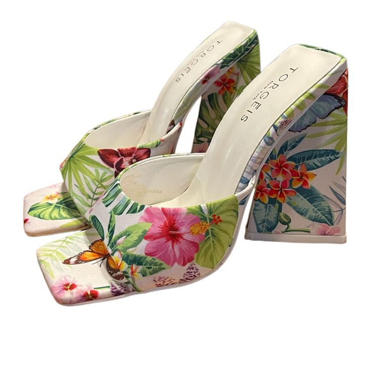 Open Toe Block High Heels Square Toe Tropical Butterfly Pattern New Without Tags/Box Heel Height: 1.25, 4.25 Shaft Height: 4.25 Slip On Formal 100% Faux Leather Upper: 100% Recycled Textile, Outsole: 70% Rubber, 30% Recycled Rubber, Lining: 100% Recycled Textile Spot Clean White Heels For Vacation In Spring, White Heels For Spring Vacation, Synthetic High Heel Summer Heels, White Synthetic Summer Heels, White Pointed Toe Heels For Beach, Summer Heels With Wrapped Heel In Synthetic, Floral Print Summer Heels, Open Toe Tropical Sandals For Spring, Vacation Heels With Floral Print And Round Toe