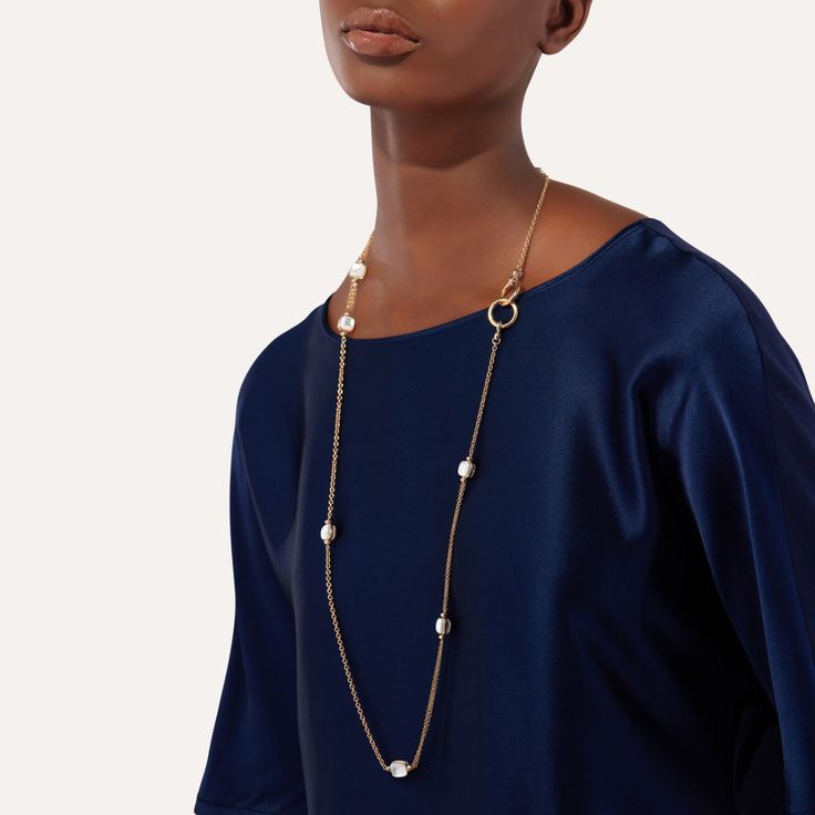 Find POMELLATO Nudo Necklace on Editorialist. Nudo sparkles in a brilliant sautoir design that may be worn in three different ways: a classic sautoir, a lariat pendant, or a double-wrap necklace. For the first time, Nudo’s stones feature the “Clessidra” (Italian for “hourglass”) double-face cut, leaving the gem more preciously nude than ever before. New Zealand Jewellery, Face Cut, Wrap Necklaces, Stone Feature, Necklace Online, Timeless Jewelry, Mother Pearl, High Jewelry, White Topaz