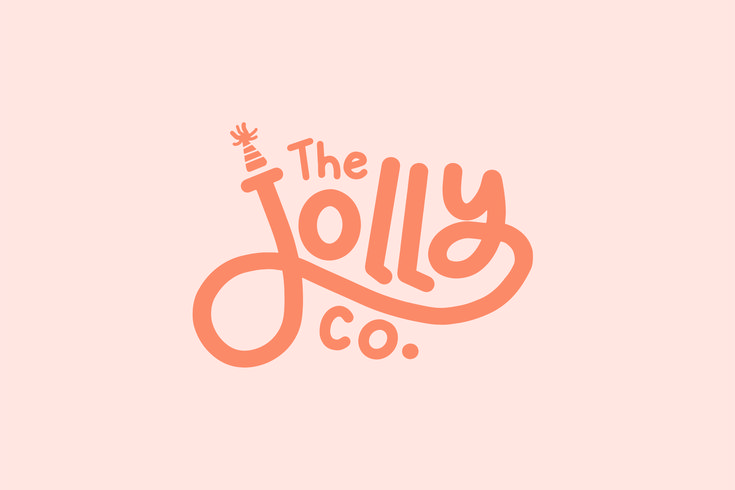 the jolly co logo is shown in brown on a light gray background with an orange font