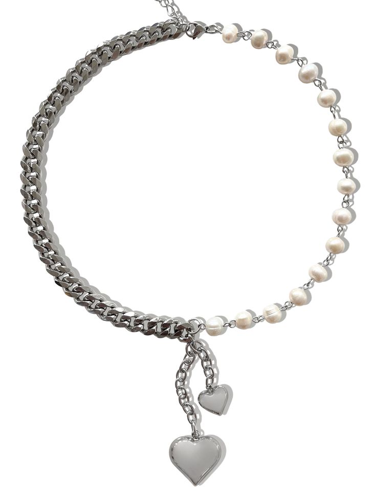 It's time for a heart to heart... you NEED this necklace in your life. Featuring two stunning puffed heart pendants paired alongside freshwater pearls and stainless steel chain, you’ll make jaws drop every time you wear this piece! Made with genuine freshwater pearls, stainless steel pendants and chain. Waterproof & rust-free. Available in lengths 14", 15", 16", 18", 20". All lengths include a 2" extension chain Model is wearing 16". Handmade with love in Los Angeles. Silver Heart-shaped Jewelry With Pearl Charm, Heart-shaped Silver Necklace With Pearl Charm, Silver Heart Necklace With Pearl Chain, Silver Pearl Necklaces With Heart Charm, Silver Heart Necklace With Pearl Chain For Valentine's Day, Heart Shaped Silver Jewelry With Pearl Chain, Silver Heart-shaped Pearl Chain Necklace, Silver Necklace With Pearl Chain For Valentine's Day, Silver Pearl Chain Necklace For Valentine's Day