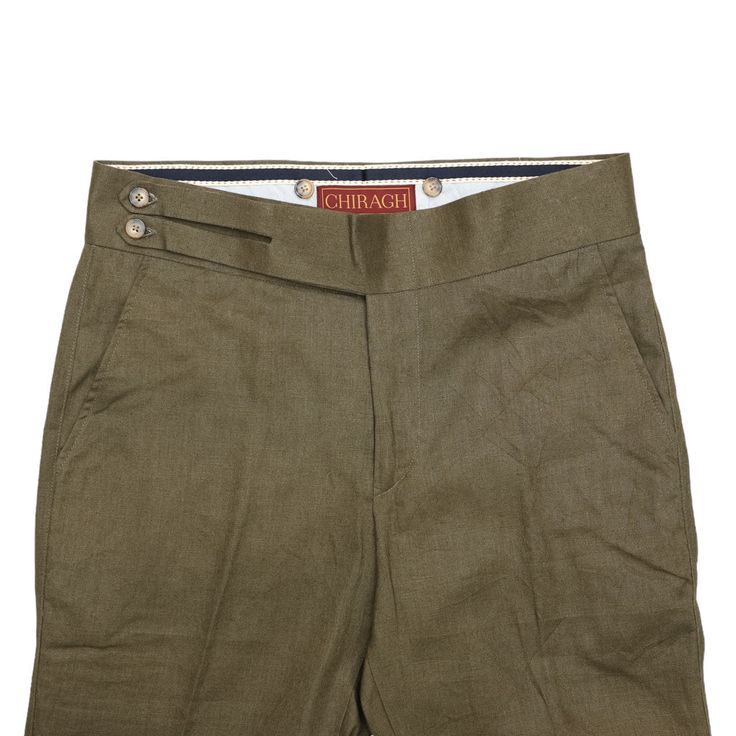 A must-have style in every man’s wardrobe, you will never look boring again with these solid trousers in olive green. Elegantly made with high quality craftsmanship in a straight fit, flat-front style from premium quality cotton, these trousers feature a button and zip closure with a wide waistband with two extended fastening tabs. This pair of men's pants is perfect for work and everyday wear, business meetings, parties, gala dinners or summer weddings. Buy it for yourself, or gift it to a loved one for an anniversary, holiday, birthday or just because. Actual colors may vary. This is due to computer monitors displaying colors differently and everyone can see these colors differently. ABOUT: • Brand: Chiragh • Color: Olive green • Features: Four pockets, cummerbund-style waistband • Fit: Green Pants With Welt Pockets And Straight Hem, Classic Green Bottoms With Straight Hem, Tailored Green Bottoms With Welt Pockets, Business Casual Khaki Pants With Belt Loops, Classic Green Chinos For Workwear, Tailored Green Dress Pants With Welt Pockets, Green Tailored Dress Pants With Welt Pockets, Classic Green Workwear Chinos, Classic Fitted Green Chinos