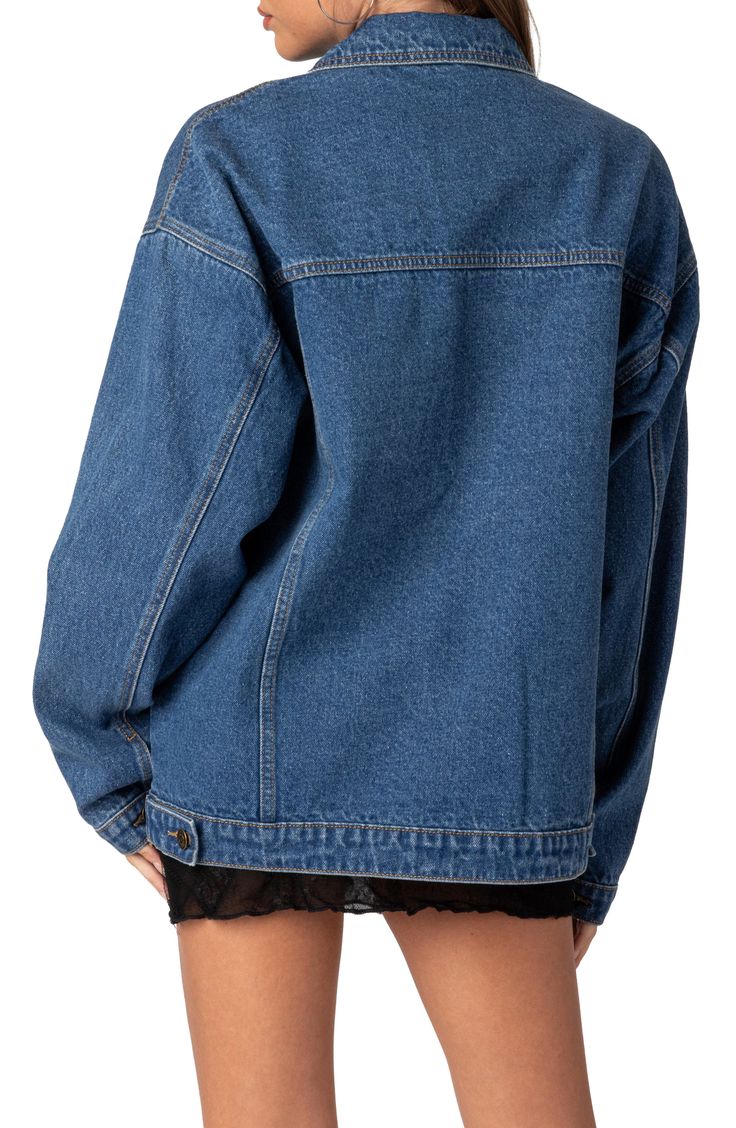 Bigger is always better as this oversized denim jacket attests with a relaxed silhouette and drop-shoulder design. Spread collar 100% cotton Machine wash, line dry Imported Oversized Fall Denim Jacket For Everyday, Trendy Oversized Denim Jacket With Pockets, Oversized Spring Shacket For Streetwear, Oversized Dark Wash Trendy Shacket, Oversized Dark Wash Shacket For Spring, Oversized Cotton Shacket For Streetwear, Oversized Denim Shacket With Pockets, Oversized Denim Blue Trendy Outerwear, Oversized Medium Wash Cotton Shacket