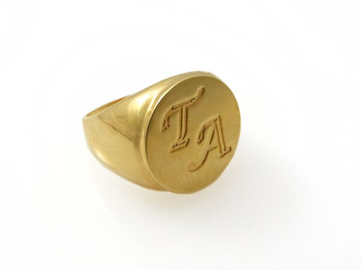 14k Men monogram ring. College ring. Initial ring. Gold monogram ring. Men initial band. Mens initial ring. Silver ring 🌟 Rings info: The ring is made of solid gold 14k , with a shiny finish. The ring is measures 15.5 mm on the widest part and 3 mm on the back. You can order 1 or 2 initials. ⚠ Don't forget to write me the initials you wish (one or two) for in the note box on the checkout page ⚠ The ring can be ordered in any size. 🌟 Shipping Info: All rings are packaged and shipped in a beauti Timeless Formal Signet Ring With Initials, 14k Yellow Gold Signet Ring With Initials, 14k Gold Signet Ring With Initials For Formal Occasions, Formal 14k Gold Signet Ring With Initials, Timeless 14k Gold Monogram Ring, Timeless Yellow Gold Initial Ring With Monogram, Timeless Oval Initial Ring, Timeless Yellow Gold Monogram Initial Ring, Timeless Yellow Gold Jewelry With Monogram