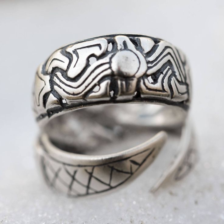 Replica of a massive viking ring crafted in the Borre style, the original artefact was discovered in Norway. - material sterling silver - one size only - adjustable to fit diameters 1.7 cm-2.2 cm/0.67-0.79 inch - weight 4.7 g Adjustable Engraved Antique Silver Ring, Ceremonial Adjustable Silver Engraved Ring, Handmade Adjustable Engraved Ring For Ceremonial Use, Handmade Adjustable Engraved Ring For Ceremonial Occasions, Unique Adjustable Engraved Ring As Collectible, Artisan Adjustable Engraved Silver Ring, Handmade Adjustable Ceremonial Engraved Ring, Artisan Sterling Silver Adjustable Engraved Ring, Unique Adjustable Engraved Ring With Oxidized Finish