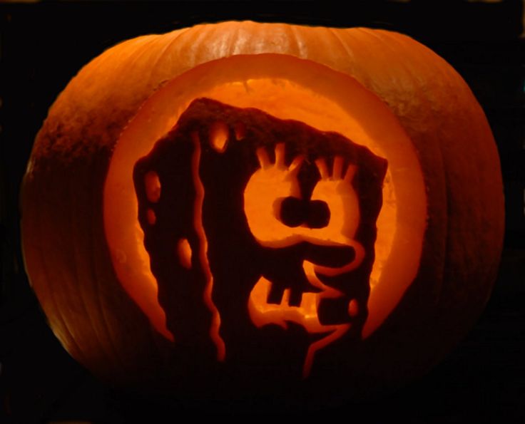 a pumpkin carved to look like it has been carved into the shape of a cat