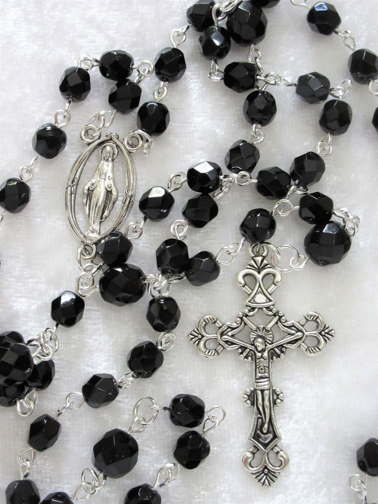 "This black Czech crystal rosary is made with 6mm beads. It is standard sized, measuring 27\" around with a 5\" crucifix drop. The rosary parts are pewter and the wires are hand turned and silver plated. It is a suitable unisex Catholic gift. The rosary will be slipped into a velvet bag and shipped in a bubble mailer." Silver Rosary With Black Beads And Crucifix, Black Crucifix Jewelry For Jewelry Making, Black Crucifix Rosary As Gift, Black Cross Rosary As Gift, Black Crucifix Rosary Bracelet As Gift, Crystal Rosary, Catholic Rosary, The Rosary, Rosary Catholic