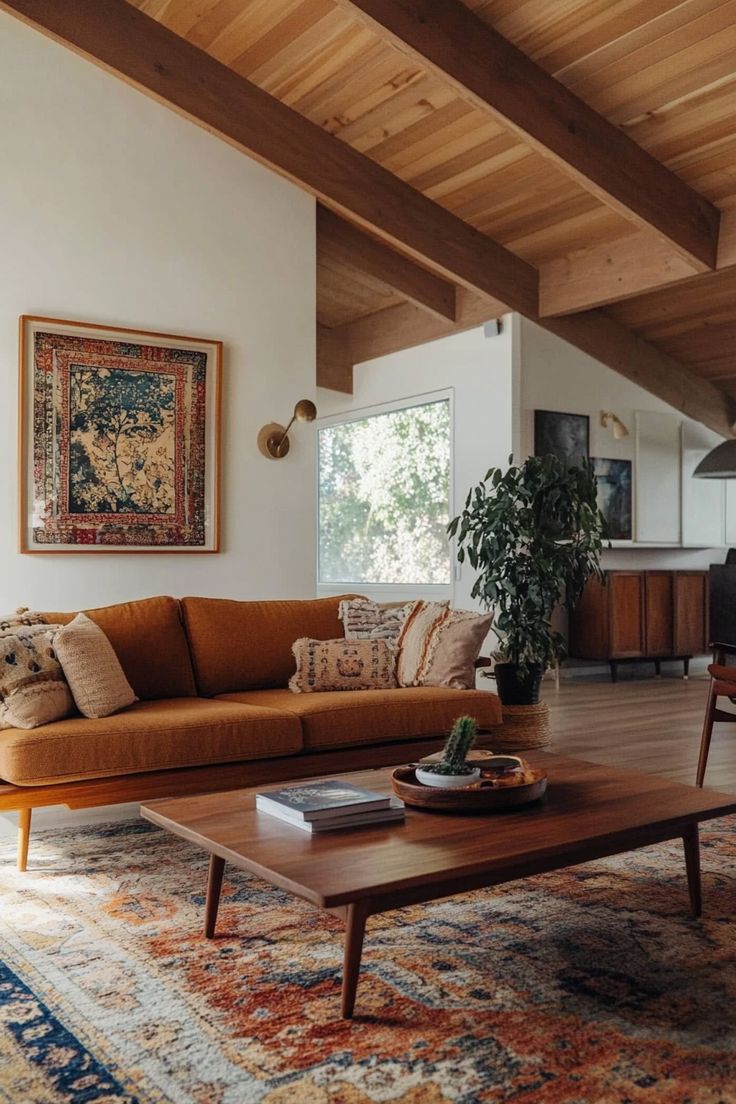 a living room filled with furniture and a rug