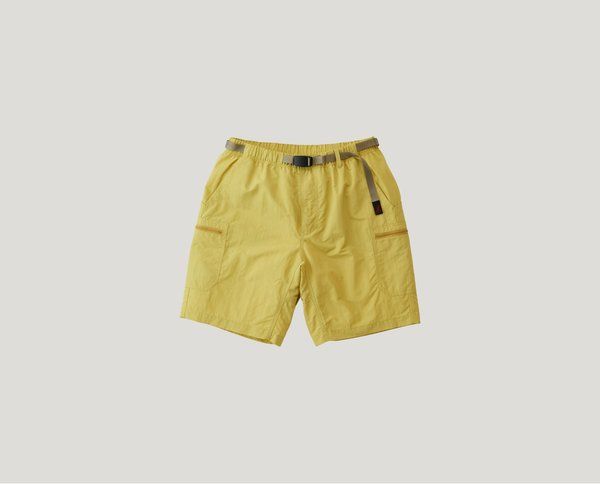 The nylon utility short is a go-anywhere short designed for hiking swimming or to be worn as functional stylish streetwear. these shorts feature seven pockets that will help you keep your gear handy and organized. the back pocket has a vertical cut and the front and back pocket openings have a unique look when viewed from the side. the lightweight nylon delivers superb breathability and easy movement with a gusseted crotch enabling 180-degree leg movement. these hiking shorts are water-repellent and dry quickly making them ideal for an impromptu swim or for weathering a storm. Outdoor Nylon Shorts, Functional Nylon Outdoor Shorts, Yellow Streetwear Shorts With Pockets, Yellow Cotton Shorts, Leg Movement, Gramicci Shorts, Hiking Shorts, Canary Yellow, Designer Shorts