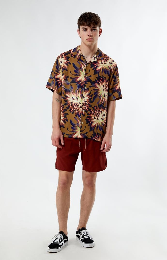 Embrace the essence of summer with our PacSun Printed Camp Shirt. Boasting a collared neckline, short sleeves, and a lightweight feel, it's the epitome of laid-back comfort. Featuring a custom pattern and button closures, this shirt brings a touch of vacation vibes to any outfit.


	Collared neckline
	Short sleeves
	Standard fit
	Button closures
	Lightweight
	Custom pattern
	100% Viscose
	Machine washable
	Model is wearing size medium
	Model Measurements: 6'1” Height, 31” Waist, 33” Inseam Summer Beach Shirt With Collared Neckline, Relaxed Fit Hawaiian Shirt With Collar For Summer, Relaxed Fit Collared Hawaiian Shirt For Summer, Collared Summer Camp Shirt For Vacation, Summer Collared Camp Shirt For Beach, Multicolor Camp Collar Tops For Summer, Casual Beach Shirt With Collared Neckline, Summer Camp Shirt For Beach With Collar, Multicolor Collared Top For Summer