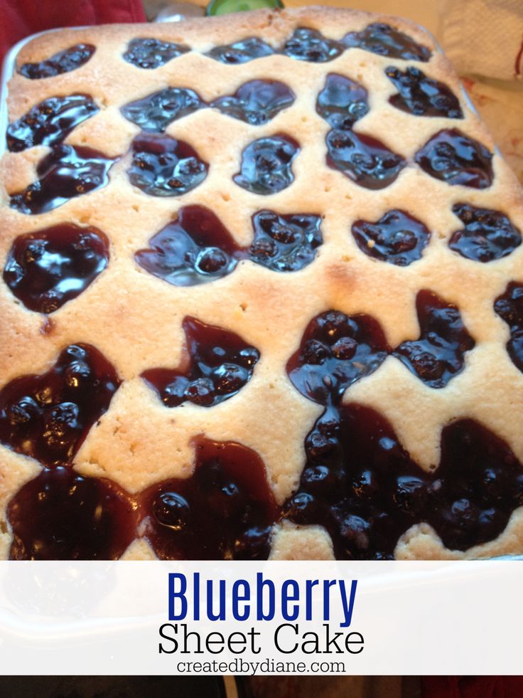 blueberry sheet cake in a pan with the words blueberry sheet cake on it