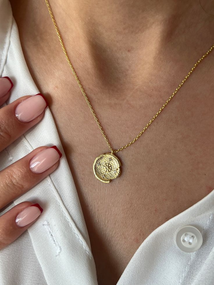 Find your direction with our Compass Necklace  Get this cute jewelry made with the high quality elements✨ You can go with 925K Sterling Silver with the options of Gold, Rose Gold or White Gold finish Beautiful jewelry for everyone 💙 Details * 925K Sterling Silver → 14K Gold, Rose Gold or White Gold plated * Chain length is approximately 18 inches (16+2 in extender) / 45 cm (40+5 cm extender) * Time is important! You will receive your package as soon as possible 🚚 * We care about the quality of Tarnish Resistant Silver Charm Necklace In Recycled Gold, Everyday Gold Sterling Silver Coin Necklace, Everyday Gold Coin Necklace In Sterling Silver, Amulet Sterling Silver Coin Necklace In Yellow Gold, Amulet Style Yellow Gold Sterling Silver Coin Necklace, Recycled Gold Coin Pendant Jewelry Gift, Sterling Silver Round Pendant Medallion Necklace As Gift, Sterling Silver Round Medallion Necklace As Gift, Sterling Silver Tarnish Resistant Medallion Necklace