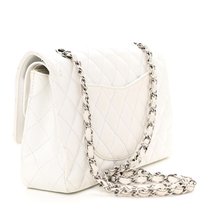 This is an authentic CHANEL Caviar Quilted Medium Double Flap White. This stunning shoulder bag is crafted of diamond quilted luxurious caviar leather in white. The bag features a silver chain-link leather-threaded shoulder strap, a rear patch pocket, and a silver Chanel CC turn lock. This opens to reveal an inner flap and a matte white leather interior with patch pockets. Classic Phones, Chanel Double Flap, Chanel Crossbody, Chanel Tweed, Chanel Flap Bag, Quilted Wallet, Denim Quilt, Chanel Shoulder Bag, Leather Thread