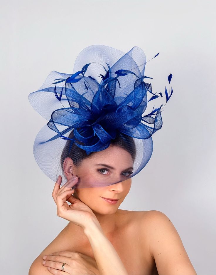 Made to order! Please order 2-3 weeks in advance prior to your event! Rushed orders are possible, please discuss! Absolutely stunning hat- fascinator, which is mounted on a separate small base with elastic and sits on top of the crown . it can be mounted on a metal headband.   This one is done in royal blue  , but taking orders for a wide variety of colors. This hat will definitely make a statement anywhere you go!! One size fits all! please be aware- since all the pieces are handmade and not do Blue Fascinator With Short Brim For Summer, Blue Short Brim Fascinator For Summer, Summer Blue Fascinator With Short Brim, Blue Short-brimmed Fascinator For Summer, Blue Curved Brim Headpiece For Kentucky Derby, Blue Curved Brim Headpiece For Royal Ascot, Elegant Blue Headpiece With Short Brim, Elegant Blue Short Brim Headpiece, Blue Headpiece For Kentucky Derby