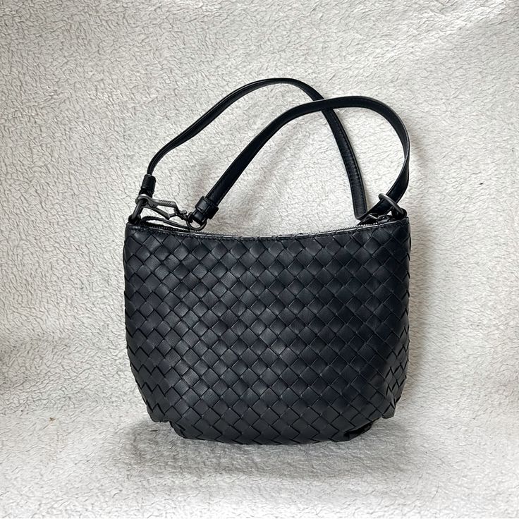 Super Cute Dot Crossbody Bag From Bottega Veneta Featuring Brand Signature Intriciato Pattern Luxe Calf Leather With Intriciato Pattern Classic Black Color Vintage Black Hardwares Bottom Side Gathering Details Top Zip Closure Inside Fabric Lining Fully Lined Single Leather Strap, Detachable Measurements Approximately 8.5in L X 7in H X 4in D Intrecciato Weave Crossbody Bag For Office, Classic Intrecciato Weave Shoulder Bag For Daily Use, Office Intrecciato Weave Crossbody Bag, Classic Everyday Shoulder Bag With Intrecciato Weave, Black Leather Shoulder Bag With Intrecciato Weave, Black Bags With Intrecciato Weave, Office Shoulder Bag With Intrecciato Weave, Classic Intrecciato Shoulder Bag For Everyday, Black Leather Intrecciato Shoulder Bag