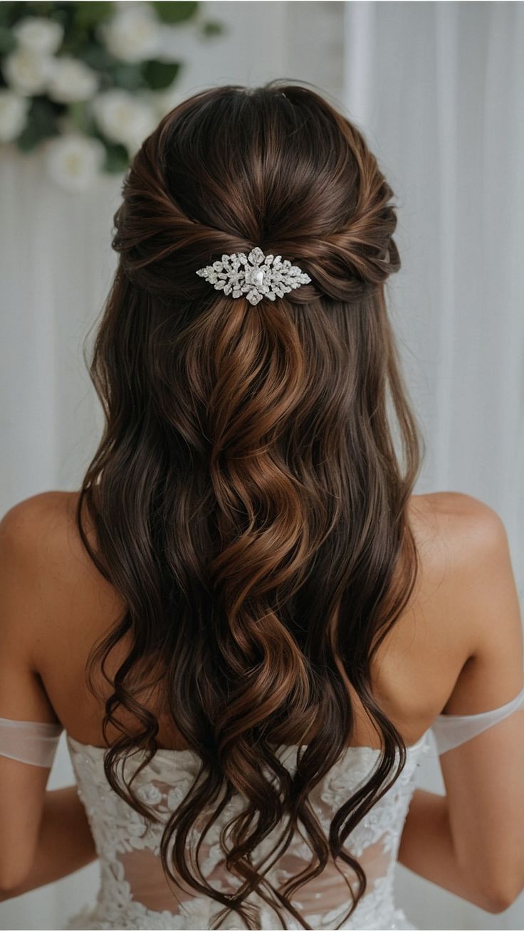 the back of a woman's head wearing a bridal hair comb