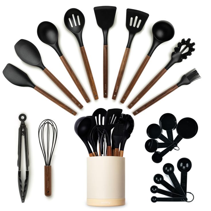 an assortment of kitchen utensils arranged in a vase