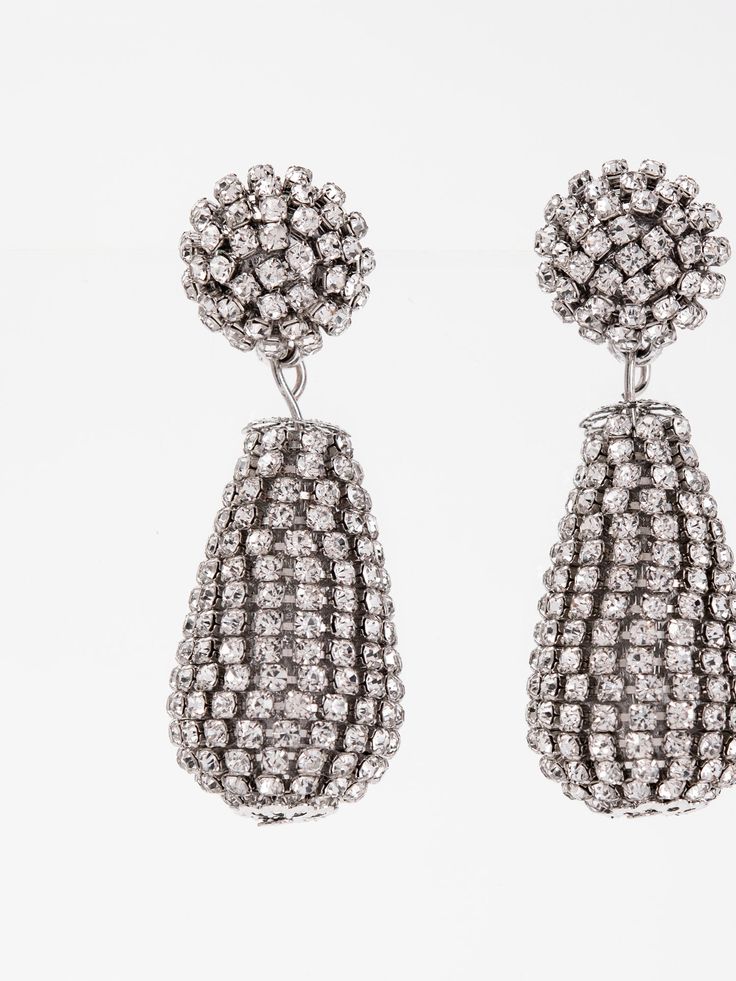 Expertly crafted, the Mila Drop Rhinestone Earrings add a touch of elegance to any outfit. With a delicate drop design and sparkling rhinestones, these earrings are perfect for any occasion. Their timeless beauty and subtle shine make them the perfect accessory for any fashion-forward individual. SizeH: 2.15"W: 0.75" QualityMade with quality materials for endurance. ImportedEY12699 Dazzling Drop Crystal Earrings, Metal Drop Crystal Earrings For Party, Dazzling Drop Earrings With Sparkling Stones, Dazzling Sparkling Crystal Drop Earrings, Evening Teardrop Chandelier Earrings With Sparkling Stones, Crystal Teardrop Earrings For Evening, Glamorous Metal Earrings With Rhinestones, Silver Teardrop Earrings With Sparkling Stones For Evening, Diamond Crystal Drop Earrings With Sparkling Stones