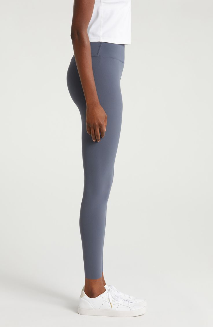 These performance leggings feature a high waist for smoothing coverage and a minimal seam design so they feel like a second skin through every activity. Pull-on style UPF 50+ sun protection 80% nylon, 20% polyester Machine wash, line dry Imported Compressive Full-length Functional Tights, Full-length Athleisure Leggings With Light Support, Athleisure Full-length Leggings With Light Support, Full Length Athleisure Leggings With Light Support, Sporty Compressive High Rise Tights, Compressive High Rise Sporty Tights, Sporty High Rise Compressive Tights, Full Length Light Support Athleisure Leggings, Compressive Full-length Sportswear Tights