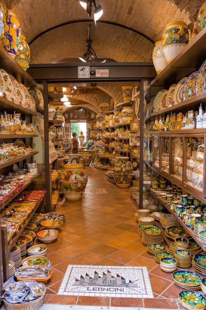 a store filled with lots of different types of dishes